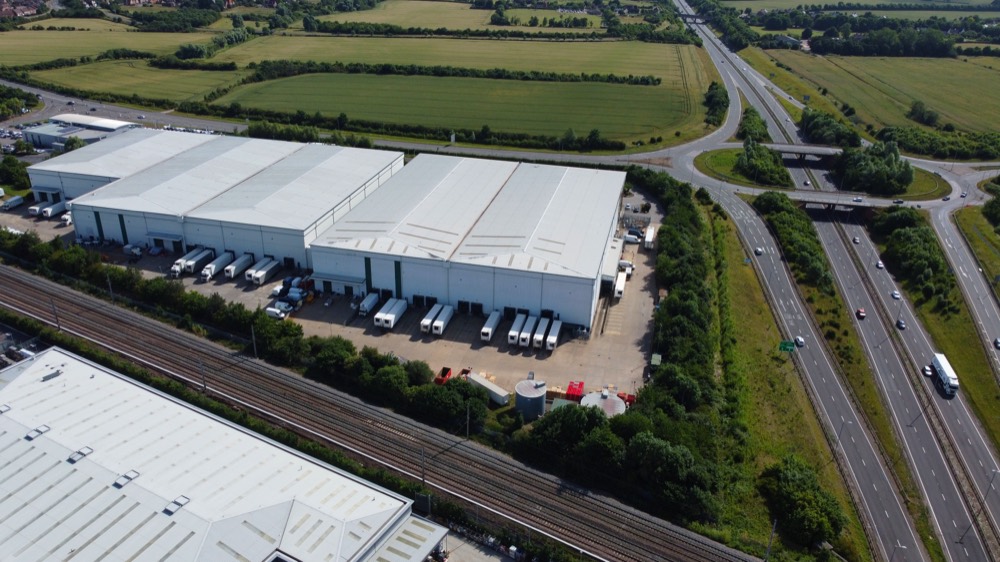 Aerial view of UK commercial estate with multiple business locations